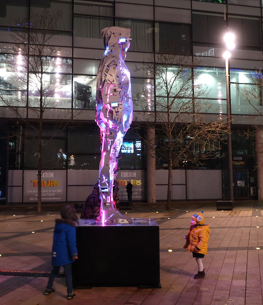 Youth Culture By Stanza. Large Light night sculpture with data and screens.