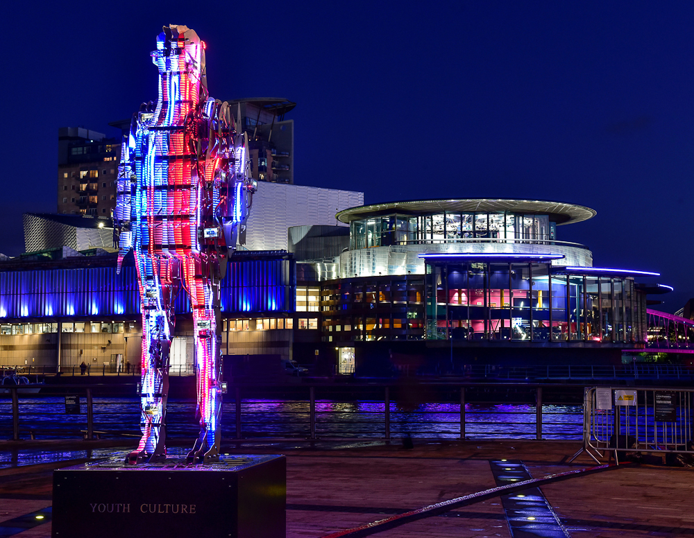 Youth Culture By Stanza. Large Light night sculpture with data and screens.